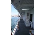 Port side upper deck passageway looking forward from the stern.
